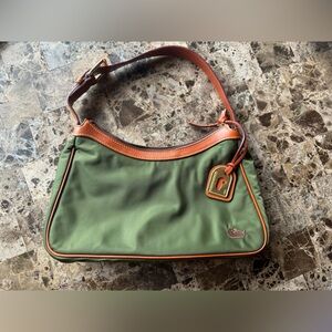 Dooney & Bourke - never used - shoulder bag,  leather strap, & goldtone detail.